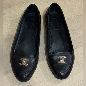 CHANEL Black Flats with Silver Logo